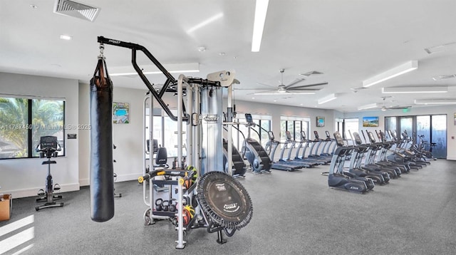 workout area featuring ceiling fan