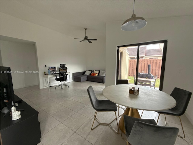 dining room featuring light tile patterned floors and ceiling fan