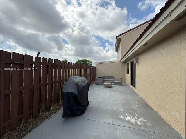 view of patio / terrace with a grill