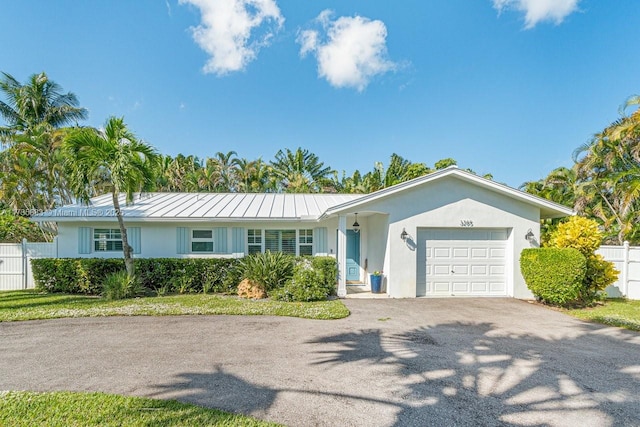 ranch-style home with a garage