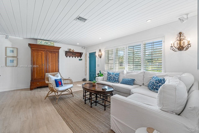 living room featuring wood ceiling and light wood-type flooring