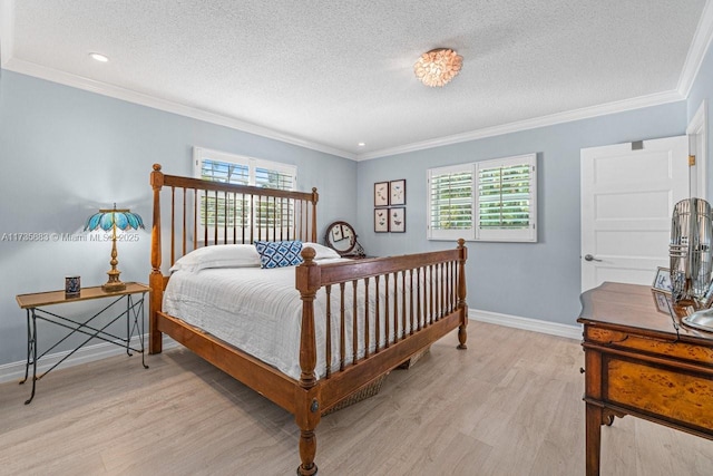 bedroom featuring crown molding, a textured ceiling, multiple windows, and light wood-type flooring