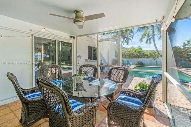 sunroom / solarium with ceiling fan