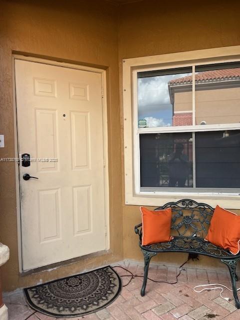 view of patio / terrace featuring grilling area, an outdoor hangout area, and a balcony