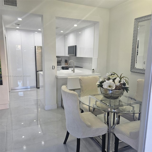 dining area with sink