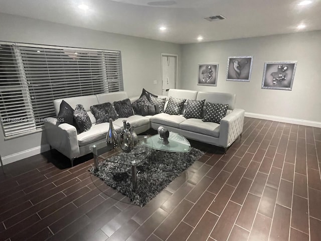 living room featuring dark hardwood / wood-style floors