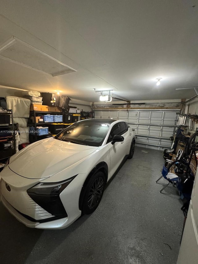 garage featuring a garage door opener