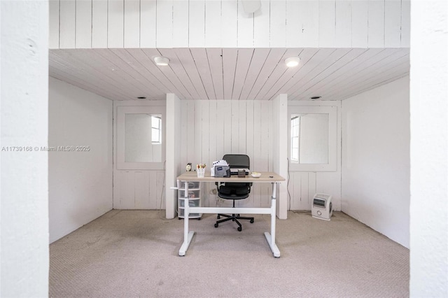 carpeted home office featuring a healthy amount of sunlight and wood ceiling