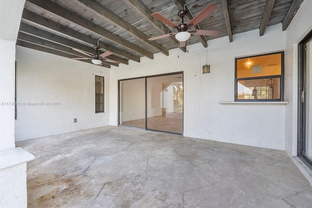 view of patio featuring ceiling fan