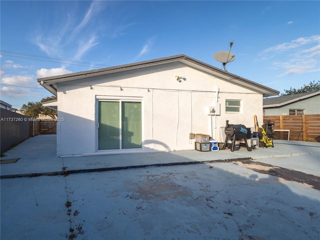 rear view of house with a patio