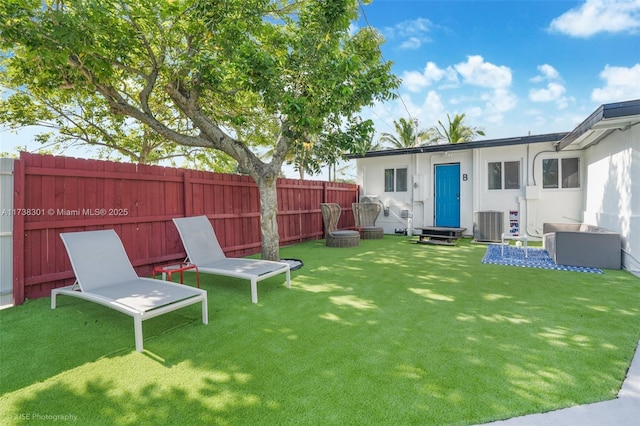 view of yard with entry steps and fence