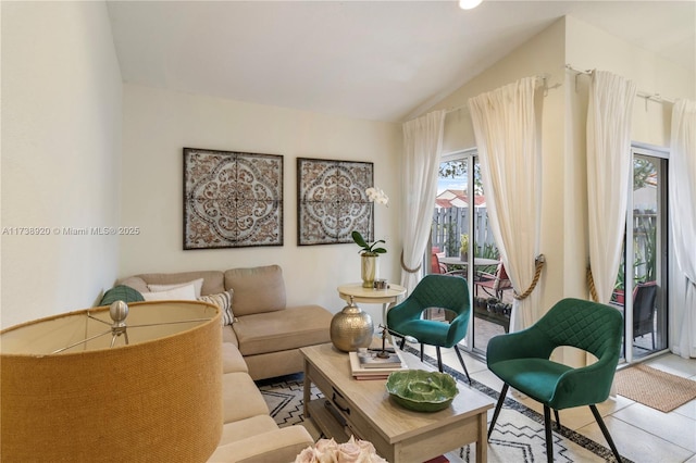 tiled living room featuring lofted ceiling