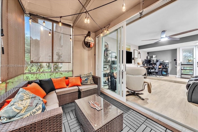 sunroom / solarium with ceiling fan