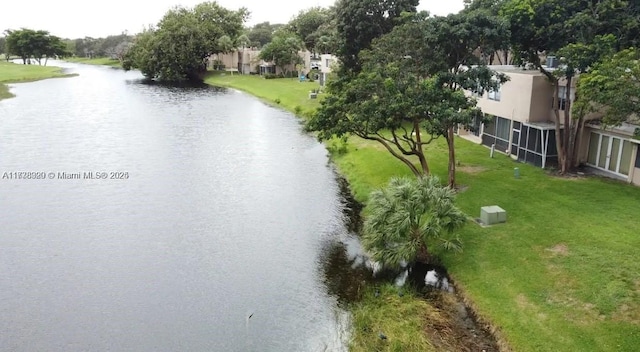 drone / aerial view featuring a water view