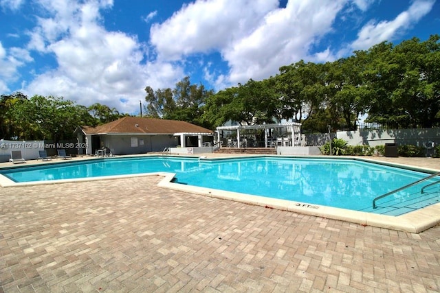 view of pool featuring a patio area