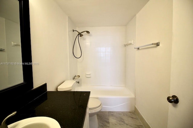 full bathroom featuring toilet, tiled shower / bath combo, and sink