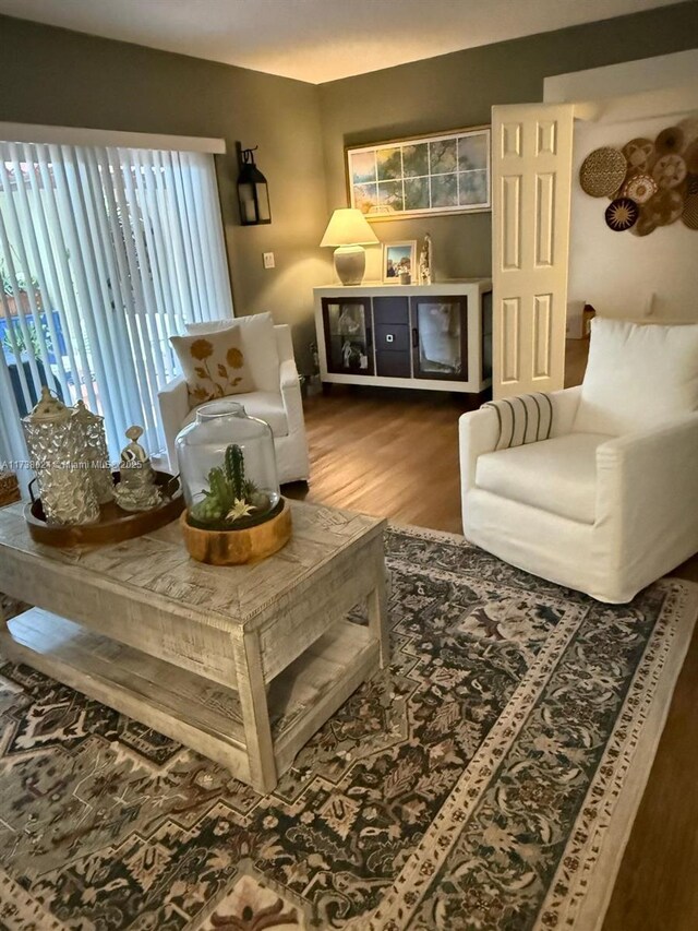 living area with wood-type flooring