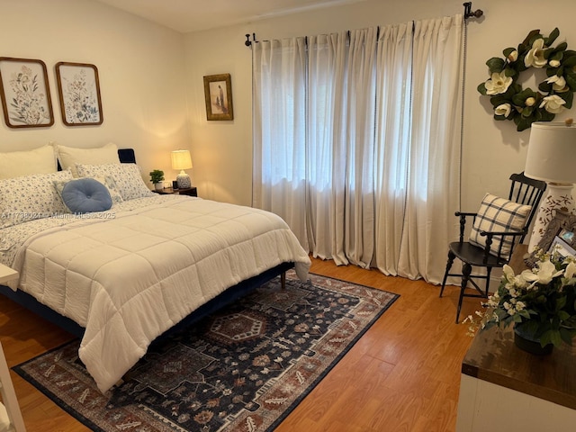 bedroom featuring wood-type flooring