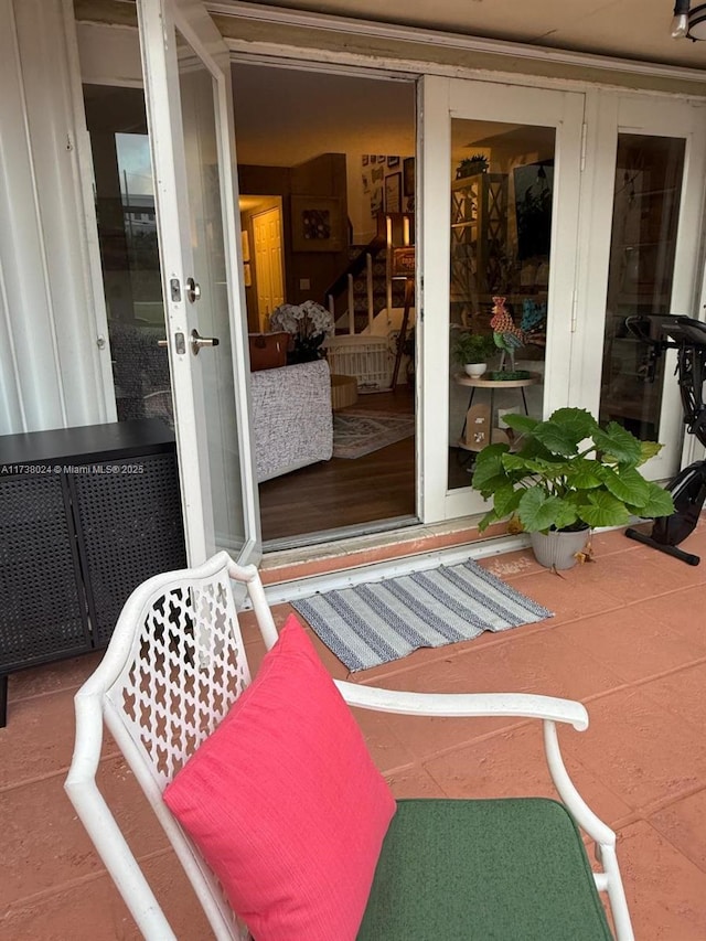 doorway to property featuring french doors