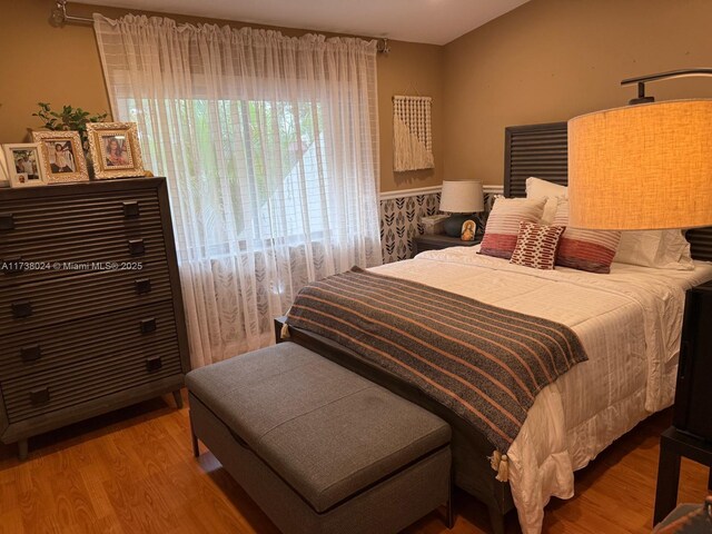 bedroom featuring light hardwood / wood-style floors