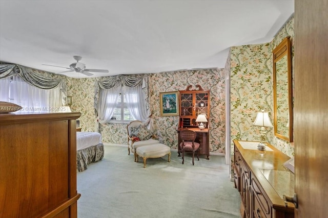 bedroom with light colored carpet and ceiling fan