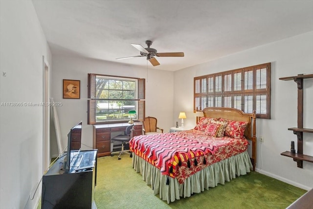 bedroom with ceiling fan and carpet flooring