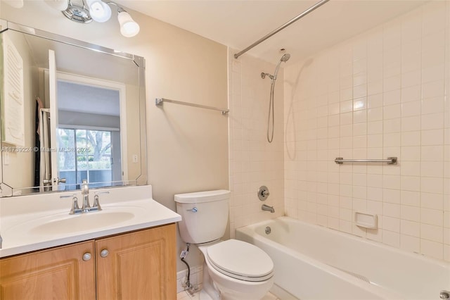 bathroom with toilet, shower / bath combination, and vanity