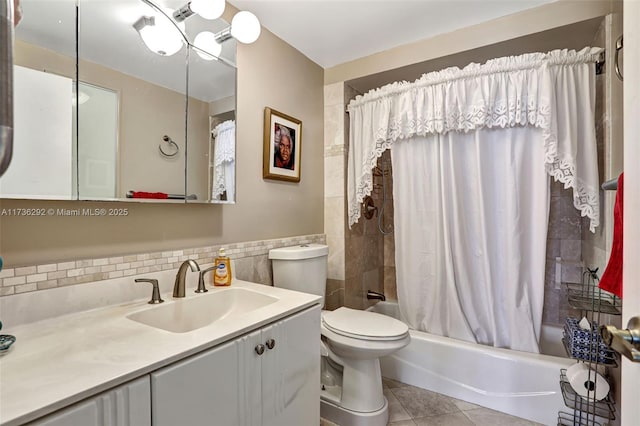 full bathroom featuring vanity, tile patterned floors, toilet, and shower / bathtub combination with curtain