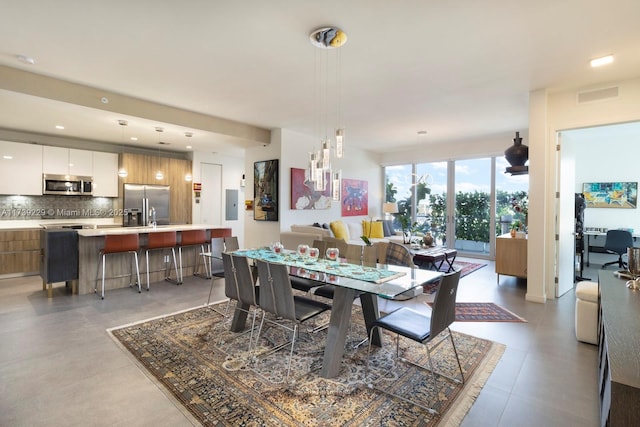 dining area with electric panel