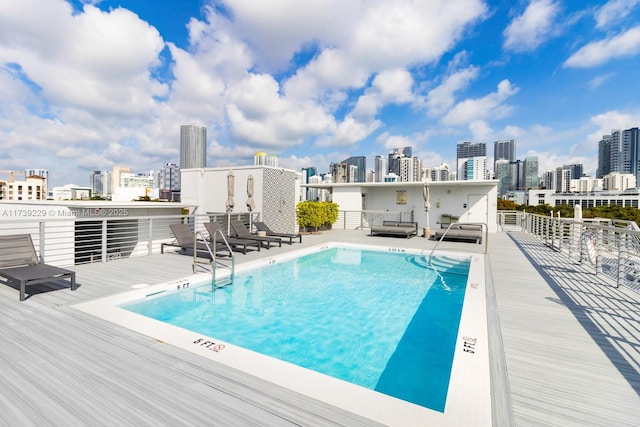 view of swimming pool featuring a patio area