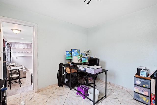 office space with light tile patterned floors