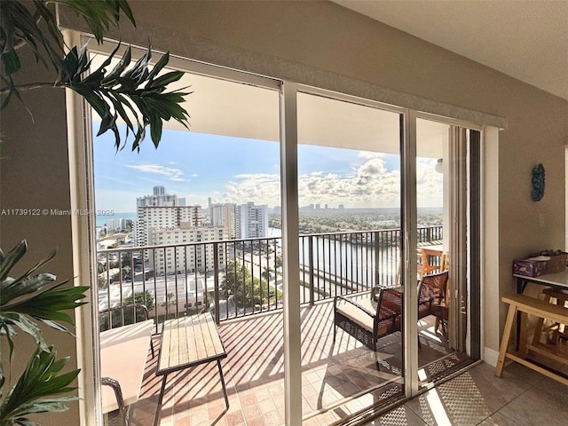 balcony featuring a water view