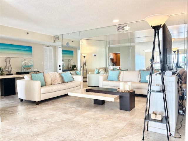 lobby featuring a textured ceiling