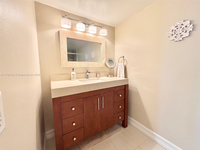 bathroom with vanity and tile patterned floors