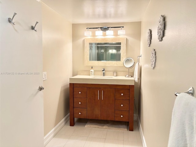 bathroom with tile patterned floors and vanity