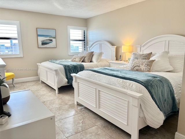 bedroom featuring a textured ceiling