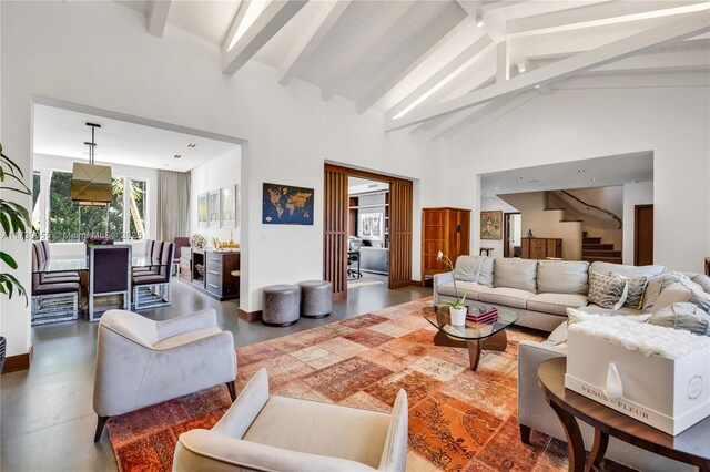 5763 N Bay Rd, Miami Beach, FL 33140 - living room featuring high vaulted ceiling and beamed ceiling