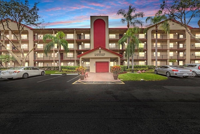 view of outdoor building at dusk