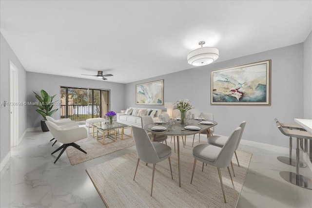 dining room with ceiling fan