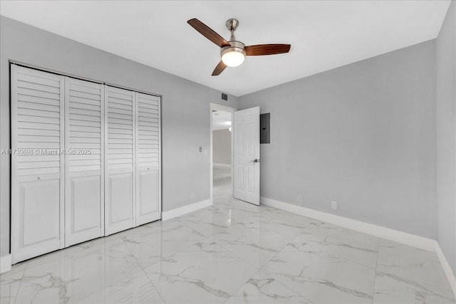 unfurnished bedroom featuring a closet and ceiling fan