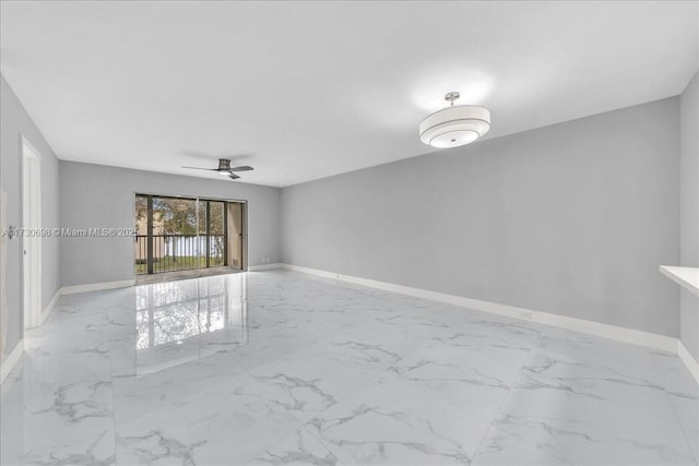 unfurnished room featuring ceiling fan