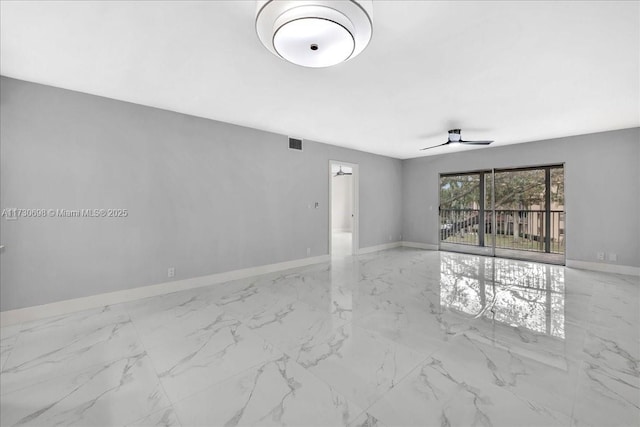 empty room featuring ceiling fan