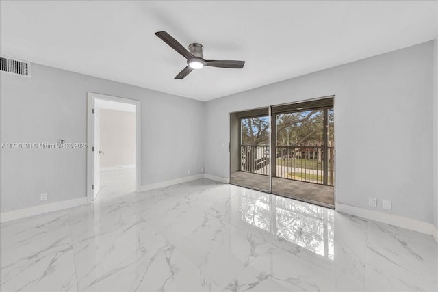 empty room featuring ceiling fan