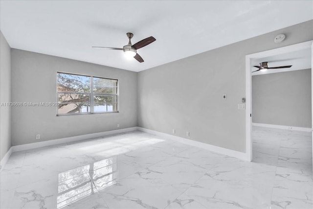 unfurnished room featuring ceiling fan