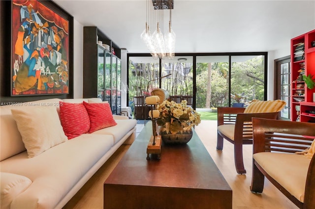 101 Ocean Lane Dr Unit 1017, Key Biscayne, FL 33149 - living room featuring a chandelier, floor to ceiling windows, and wood finished floors