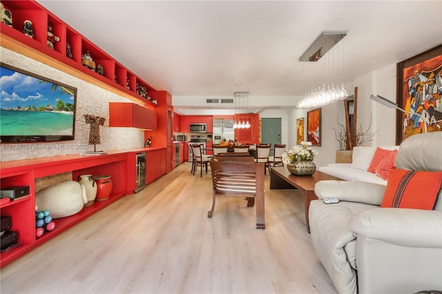 101 Ocean Lane Dr Unit 1017, Key Biscayne, FL 33149 - living room featuring beverage cooler and light wood finished floors