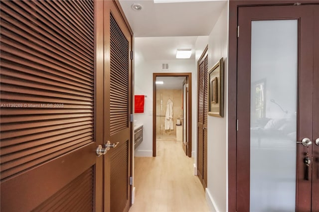 101 Ocean Lane Dr Unit 1017, Key Biscayne, FL 33149 - hall featuring light wood finished floors and baseboards