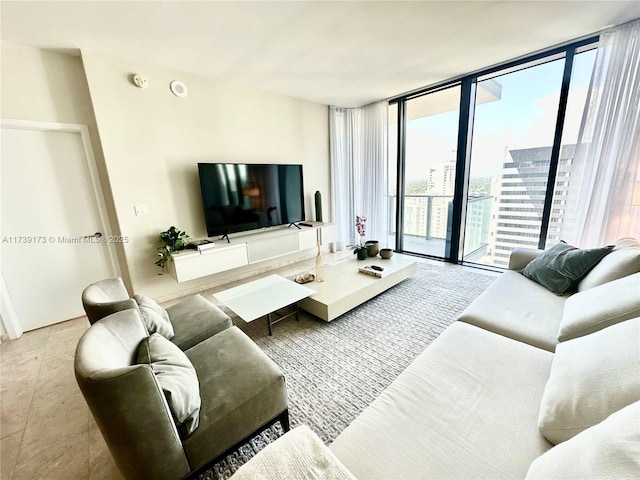 living room featuring a wall of windows