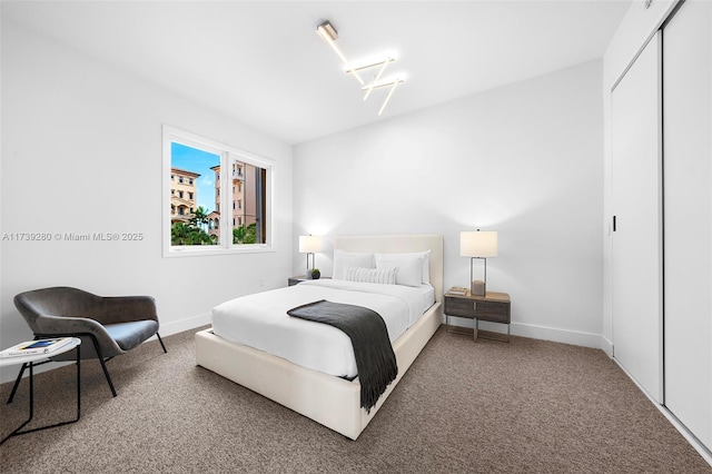 bedroom with carpet floors and a closet