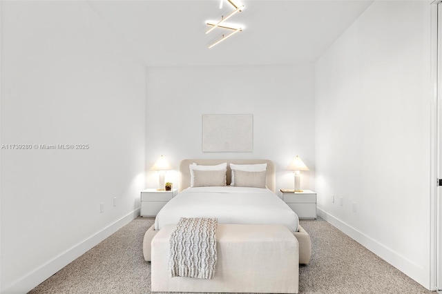 bedroom featuring light carpet